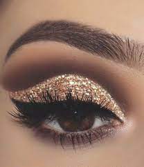 Makeup Eyeshadow Achieve A Pretty But Easy Eye Makeup Look With Our Peachy Eyeshadow Tutorial Ther Gold Glitter Eyeshadow Glitter Eye Makeup Gold Makeup Looks