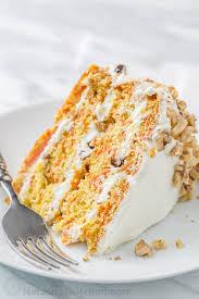 Carrot cake is simple to make and a change from a basic victoria sponge (image: Classic Carrot Cake Video Recipe Natashaskitchen Com