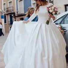 How should i accessorize a ball gown wedding dress? Simple Backless Long Sleeve Satin Ball Gown Wedding Dresses June Bridals