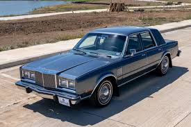 Image result for Radiant Silver 1985 Chrysler