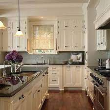 Bronze Hardware Design Decor Photos Pictures Ideas Inspiration Paint Colors And Remodel Kitchen Remodel Ivory Kitchen Cabinets Home Kitchens