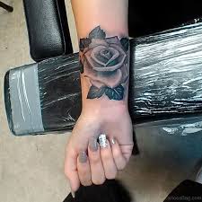 15 Delightful Black Rose Tattoos On Wrist Rose Tattoos On Wrist Wrist Tattoo Cover Up Rose Tattoos For Women
