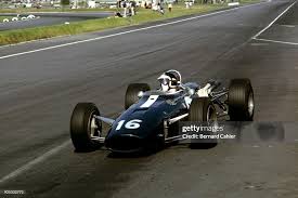 1966 Mexico F1 ..Big John winner...on the big Cooper! After the Eagle with the neck cut at Monaco 67, here is the Cooper-Maserati with his normal neck! (from my archives)