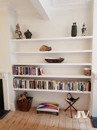 Long floating shelves with doors. Fitted Alcove Cupboards Bookshelves And Bookcases Jv Carpentry