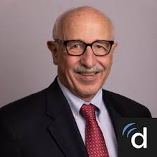 Dr. Charles E. Rhoades, MD