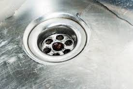 stainless steel sink plug hole close up