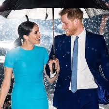 Meghan shielded harry from the rain when torrential downpours in dubbo, new south wales, nearly got in the way of his emotional speech dedicated to harry the reignmaker! Harry And Meghan S Viral Umbrella Photo Speaks For Itself Vanity Fair