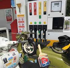E10 fuel pump filling a kawasaki with petrol the history of e10 fuel in the uk. Classic Vehicle Owners Be Afraid E10 Fuel In Uk Pumps By September Feature