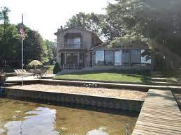 Our lake front property has a sandy beach for the kids to swim, two swing sets, horseshoe area, bonfire pit, 300 feet of lake front, a marina with boat rental and a large grass. 5br House Vacation Rental In Mears Michigan 2535532 Agreatertown