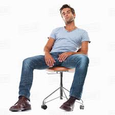Download this free photo about african american man. Portrait Of Smart Young Man Sitting Comfortably On Chair Against White Background Stock Photo Dissolve