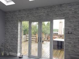 Made with various length linear pieces of slate, quartzite, travertine or marble, they can be used in kitchens, bathroom or living areas, creating. Split Face Tile Stone Effect Wallpaper Grey Tones Your 4 Walls