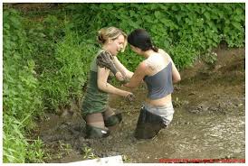 Woman wearing rubber boots in spring nature. Pin On Muddy
