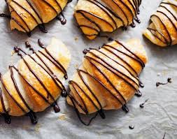 These Tasty Homemade Croissants Drizzled With Chocoley Chocolate Are So Easy To Make From Sc Chocolate Croissant Recipe Chocolate Croissant Homemade Croissants