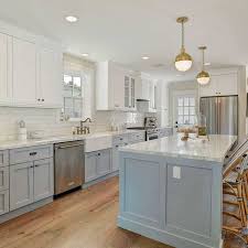 This white shaker kitchen feels open, airy, and maintains a sense of visual consistency throughout. The Top 70 Best Modern Farmhouse Kitchen Ideas Interior Home And Design