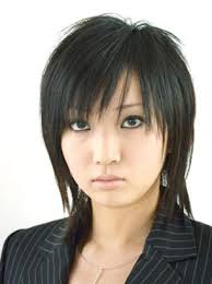 Part your hair on the side and gently tease the lengths for a polished style that requires minimal effort. Asian Layered Hairstyle With Long Side Bangs Dark Black Hair