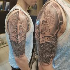 Super Realistic Knight Armour Tattoo Done By Sto Tattoo Realism Armourtattoo Blackandgreytattoo Cross Armour Tattoo Shoulder Armor Tattoo Armor Tattoo