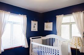 We wanted to keep the style direction a unique twist on the traditional animal print wallpaper, this baby boy nursery features a navy backdrop with rose gold images of elephants. 20 Blue Baby Nursery Ideas Blue Baby Rooms