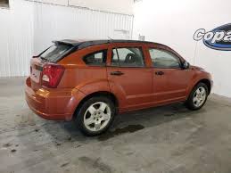 Image result for Sunburst Orange 2009 Caliber