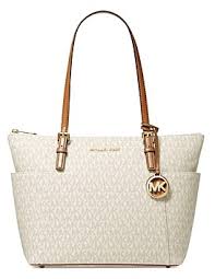 Give your wardrobe an instant upgrade with the signature look of michael michael kors handbags. Michael Kors Gold Handbags Shop The World S Largest Collection Of Fashion Shopstyle