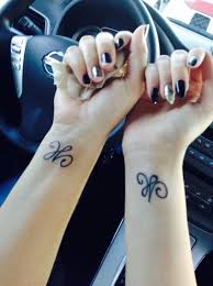 Mother and daughter symbol temporary tattoo. Matching Mother Daughter Tattoos Stands For The Love Between A Mother And Daughter Tattoos For Daughters Mother Daughter Tattoos Mother Tattoos