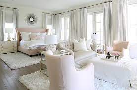 Pink And Gray Bedroom Sitting Area Is Filled With A Light Gray Velvet Tufted Settee Flanked By Bedroom Seating Area Large Master Bedroom Ideas Bedroom Seating