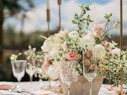 Blush And White Rustic Romantic Wedding Centerpieces White Roses Ranunculus With Pink Spr Wedding Spain Romantic Wedding Centerpieces Wedding Table Settings