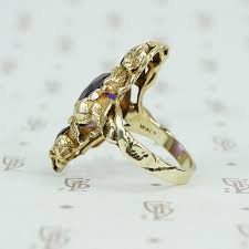 Cadmium can also be added to gold alloys to create a green color, but there are health concerns regarding its use, as cadmium is highly toxic. Among The Leaves A Walton And Co Amethyst And Green Gold Ring Gem Set Love