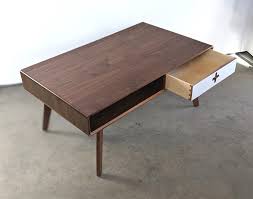 The table top is crafted from layered plywood with a melamine layer completing the top. Coffee Table Plus Mid Century Modern Walnut Coffee Table By Max Moody Design Seen At Private Residence Chattanooga Wescover