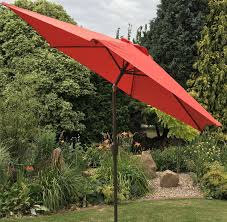 Freestanding and hanging parasols, which are easy to tilt and manoeuvre as the sun moves to give you the optimum levels of shade throughout the day, are also available. Large 2m Terracotta Crank And Tilt Garden Parasol Umbrella 200cm Metal Uk Gardens Co Uk