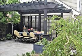 Gazebos are great additions to your backyard space. Pavers Pergola And Black Stain Transform A Chicago Backyard