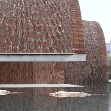 New durable, lightweight and stylish composite panels authentically replicate the look of stacked stone. Divisare Atlas Of Architecture Architecture Kiln Bricks Stone Tiles