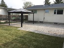 Patio pavers are only as good as their base. Roman Paver Patio And Window Wells The Lawn Salon