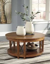 Signature Design By Ashley T433 8 Emilander Coffee Table Light Brown Ad Afflink Hom Round Wood Cocktail Table Round Cocktail Tables Coffee Table With Shelf