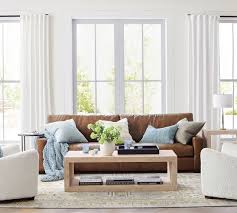 If you know me, you know i can never have enough nailheads adorning my furniture! Turner Square Arm Leather Sofa Pottery Barn