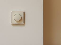 A dimmer switch is a light switch that regulates the flow of electricity to a light through use of a dial, slider, or some other control that operates internal circuitry. What Is A Rotary Dimmer Switch