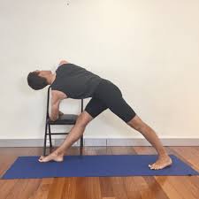 This Is A Great Variation Of Revolved Triangle One Of The 12 Yoga Poses For Easing Osteoporosis Osteopen Iyengar Yoga Poses Yoga Poses For Men Yoga For Men