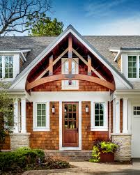 Maybe you would like to learn more about one of these? Front Entry Gable Detail With Rustic Arched Beams And Iron Brackets Craftsman Exterior Chicago By Orren Pickell Building Group Houzz
