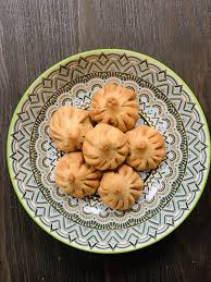 Air Fried Modak Recipe Coconut Stuffed Wheat Flour Dumplings In 2020 Sweet Dumplings Modak Recipe Crispy