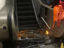 Too much space between escalator steps and sides causing shoelaces or pant legs to catch; Football Fans Injured In Apocalyptic Rome Escalator Collapse Italy The Guardian