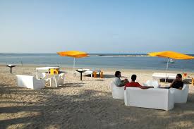 El edificio principal tiene una forma que recuerda a un ovni blanco que se. Collados Beach La Manga Strand Patio Umbrella Outdoor Outdoor Decor