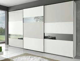 When one is looking for wardrobe designs for small bedrooms, installing a mirror finish on the doors is an excellent solution as it reflects the light and space to make the in a modern bedroom, abstract designs in neutral shades such as black, white and grey introduce a sophisticated look to the room. Get The Inspiration For The Wardrobe Door Design Ideas