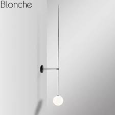 You can use sconces on the wall anywhere you'd like to add some extra lighting that is out of the way or can't be placed on a table. Post Modern Line Wall Lamp Minimalism Nordic Glass Ball Led Wall Sconce Light Fixtures Bathroom Bedside Mirror Lights Loft Decor Buy At The Price Of 45 14 In Aliexpress Com Imall Com