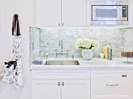 Classic white marble is coveted because it looks great in any style of kitchen, paired with any other type of material. Inspired Examples Of Marble Kitchen Countertops Hgtv