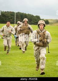 U.S. Marine Corps Sgt. Tanner Bauer, Marine Corps Shooting Team, completes  a timed run event during the Royal Marine Operational Shooting Competition  (RMOSC), hosted by the British Royal Marines at Altrar Training