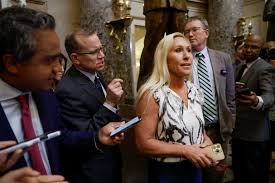 Rep. Marjorie Taylor Greene huddles with U.S. House speaker she's trying to  oust • NC Newsline