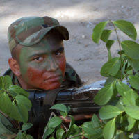 U.S. Navy Lt. Matthew Fetterman inspects one of three