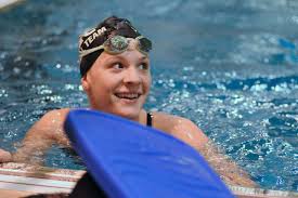 Montgomery's Glaser earns four championships in regional swim meet