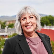Third floor of Boise City Hall. Sitting in a conference room with two City  Council Members