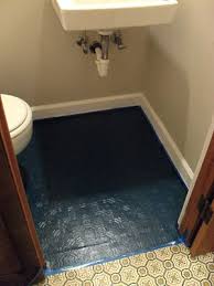 This diy painted linoleum bathroom floor was an inexpensive fix for our outdated master bathroom. Painting A Bathroom Floor Painting Bathroom Bathroom Flooring Paint Linoleum