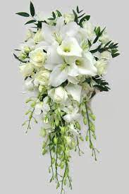 Calla lilies work well in shower bouquets as they have long slender stems. Image Result For White Calla Lily Cascade Bridal Bouquet Flower Bouquet Wedding Bridal Bouquet Cascading Bridal Bouquets